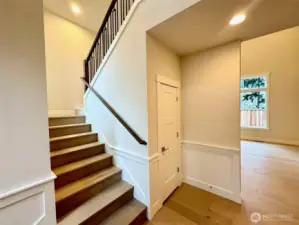 Main floor has extensive wood floor and wood stairs to Landing.