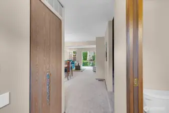 Entry with powder room to the right