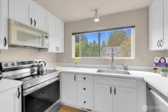 Updated kitchen with microwave being replaced at closing