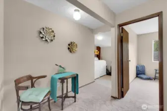 hallway on 2nd level with an arera for reading or a work-at-home set up