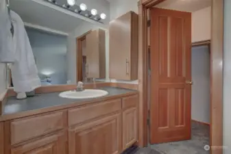 Walk-in closet to the right of the bathroom