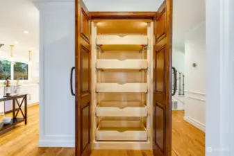 Custom built in pantry with roll out drawers
