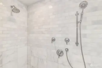 Dual head walk-in shower with glass doors