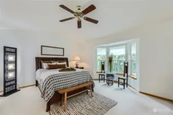 The Primary bedroom of your dreams! 2 sided fireplace, double closets, vaulted ceiling & 5 piece bath!