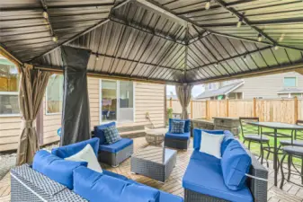 Outdoor living at its best! Outdoor flooring & gazebo included!