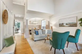 Living Room with gorgeous high Vaulted Ceiling looking toward Formal Dining