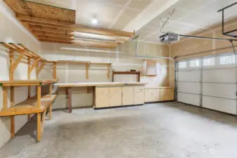 Spacious Garage with tons of extra storage/shelving