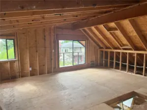 Upper level attic area; possible area for future expansion