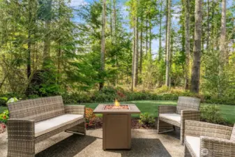 Exceptional outdoor spaces and greenbelt offing privacy.