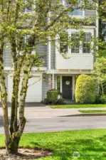 Situated on the private greenbelt with the community gathering space out front. The best of both worlds.