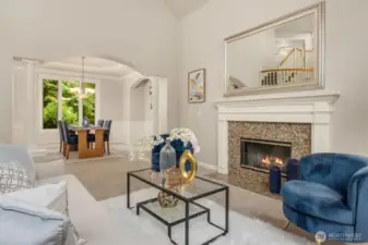Formal living with gas fireplace.