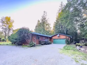 From the expansive driveway - plenty of room for cars and toys