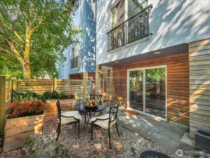 Your own private patio awaits your personal touch. Photo virtually staged.