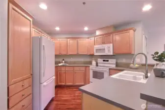 Functional kitchen layout with an abundance of cabinetry.