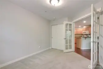 Den/bedroom with french doors.