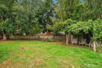 Sit under the trellis for shade!