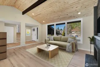 Another view of living room with TONS of natural light. Virtually staged
