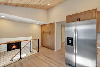 Large built in pantry cabinetry along side the new modern railings!
