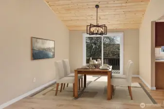 Large dining room off of kitchen and has direct access to upper portion of deck. Virtually staged