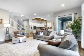 The main level features an open concept layout with 10 foot ceilings, 8 foot interior doors and engineered hickory hardwood flooring throughout!