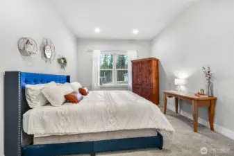 Main floor incudes a private bedroom and bathroom ideal for guests or multigenerational living!