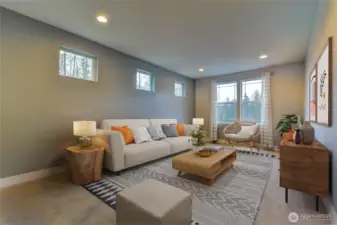 This first bonus space has been virtually staged to show the option of a 2nd family or living room.
