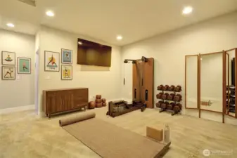 2nd upstairs bonus space is off the back bedroom.  This picture is virtually staged as a workout room!