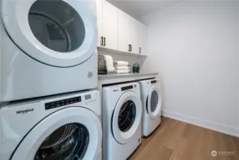 Discover the convenience of two sets of Whirlpool washer and dryer, thoughtfully designed to make laundry a breeze.