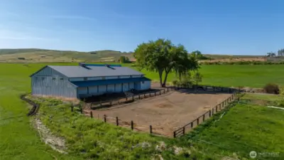 Exterior of the indoor arena and paddock. Room for 4 additional stalls. Indoor arena measures 70' x 120'.