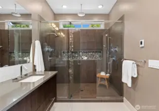 Spa-inspired bath with large walk-in shower and double vanity.