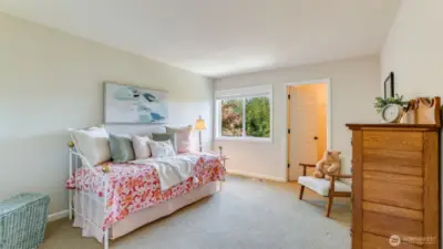 First of three secondary bedrooms with spacious walk-in closet