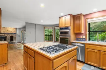 Island kitchen with gas downdraft cooktop