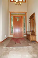 Welcome! Enter through this grand entry to your new house with solid wood doors, wood wrapped windows and sooooo much more.