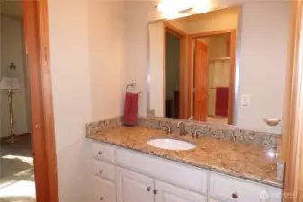 Full bathroom between for the 2 bedrooms. Door in mirror leads to tub and toilet. There's also a window above the tub for fresh air.