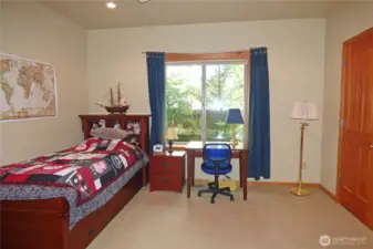 Bedroom #2 overlooking the backyard. Just out of the photo is the ceiling fan.
