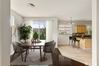 Virtual Staged with plenty of room and flowing into the kitchen