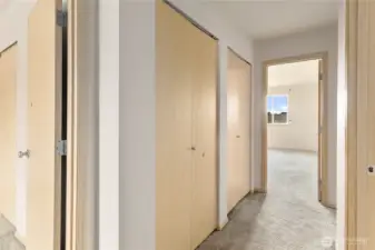So much storage in the hall closets as you approach the Primary bedroom.