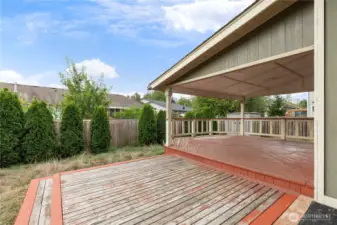 Huge covered deck to entertain on and fully fenced back yard