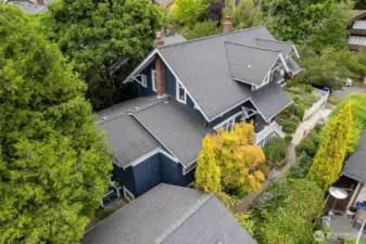 Located on a 5,000 square foot lot - there's privacy and space between the two structures, with a floral garden in between!