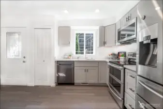 Remodeled kitchen with new cabinets and sleek countertops