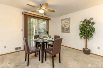 Sliding glass doors lead to the composite covered deck.