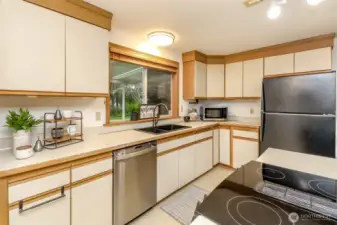 Another angle of the kitchen with beautiful black granite sink. Special cleaning instructions... clean with vegetable oil only.