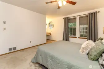 On this side of the primary is a makeup.dressing table area.