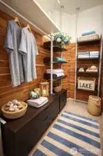 Primary custom cedar lined walk in closet