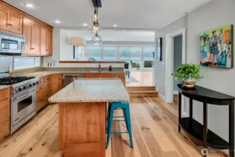 Open to the living room and outside deck