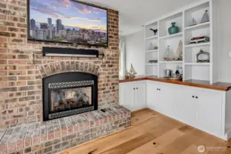 Custom built-in's flank the fireplace