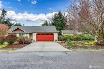 Lovely curb appeal provided by mature landscaping