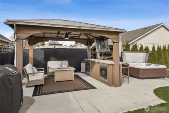 Grab a beverage and watch the Mariners from your own backyard oasis- kitchenette with water & refrigerator, eat at bar, sturdy covered gazebo with room for the BBQ and hot tub.