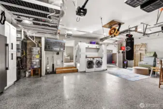 Epoxy floors, storage cabinets, laundry area + a single door garage leading to the backyard. 2 year old Dakine heat pump with new furnace and high end filtration for household Asthma with UV filter and Dakine micron filter.