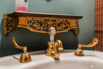 Interesting faucet in 1/2 bath next to the kitchen